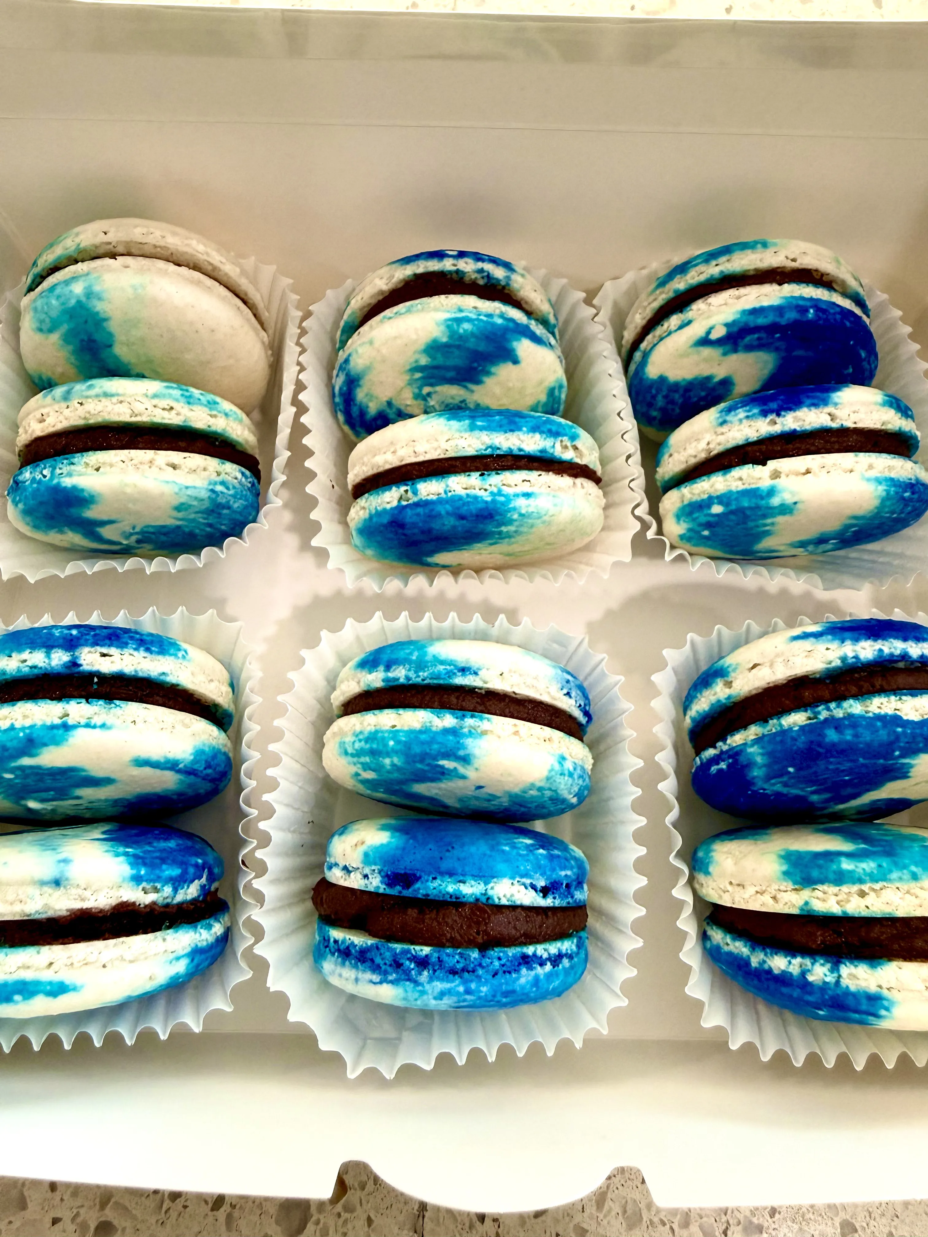Blue macarons in box